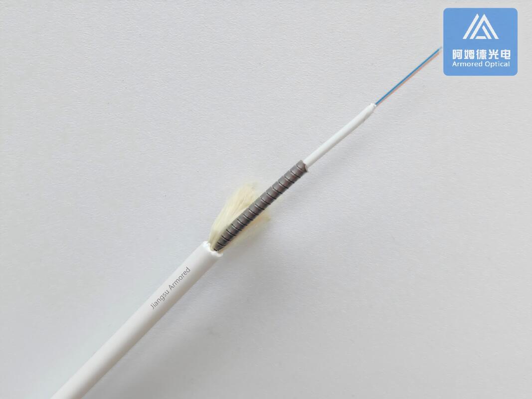 Duplex SM Spiral Armored Fiber Patch Cable 3.0mm White LSZH Rodent Resistant FTTH